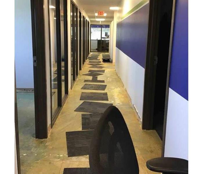 Water damage inside an office building after a storm